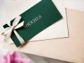 Elegancki voucher z kokardką, idealny prezent na dzień szwagra.