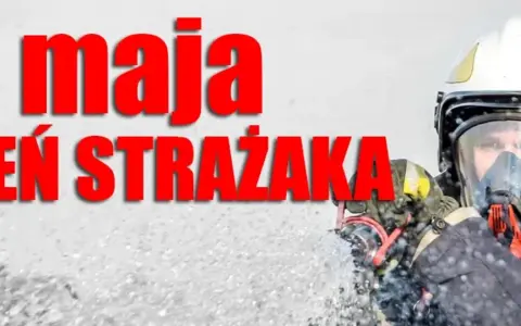 4 maja, Dzień Strażaka. Strażak w pełnym rynsztunku, z maską na twarzy, gotowy do akcji.