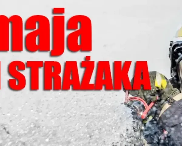 4 maja, Dzień Strażaka. Strażak w pełnym rynsztunku, z maską na twarzy, gotowy do akcji.